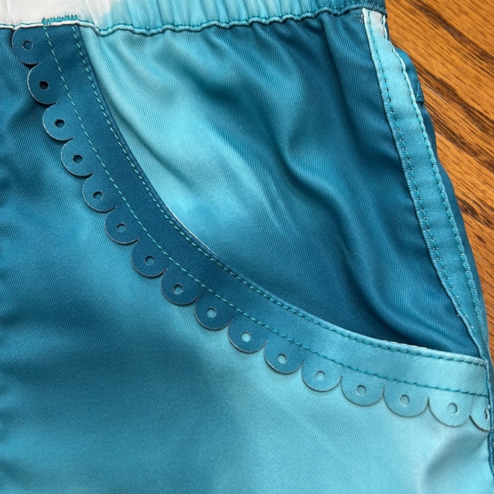 Lululemon teal running shorts with pockets scalloped detailing around pockets.. - Picture 3 of 8